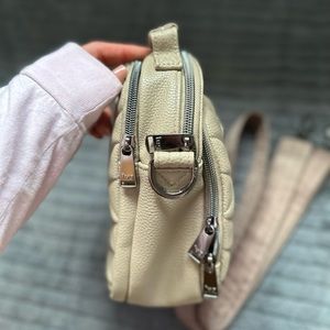 Lug cross body bag